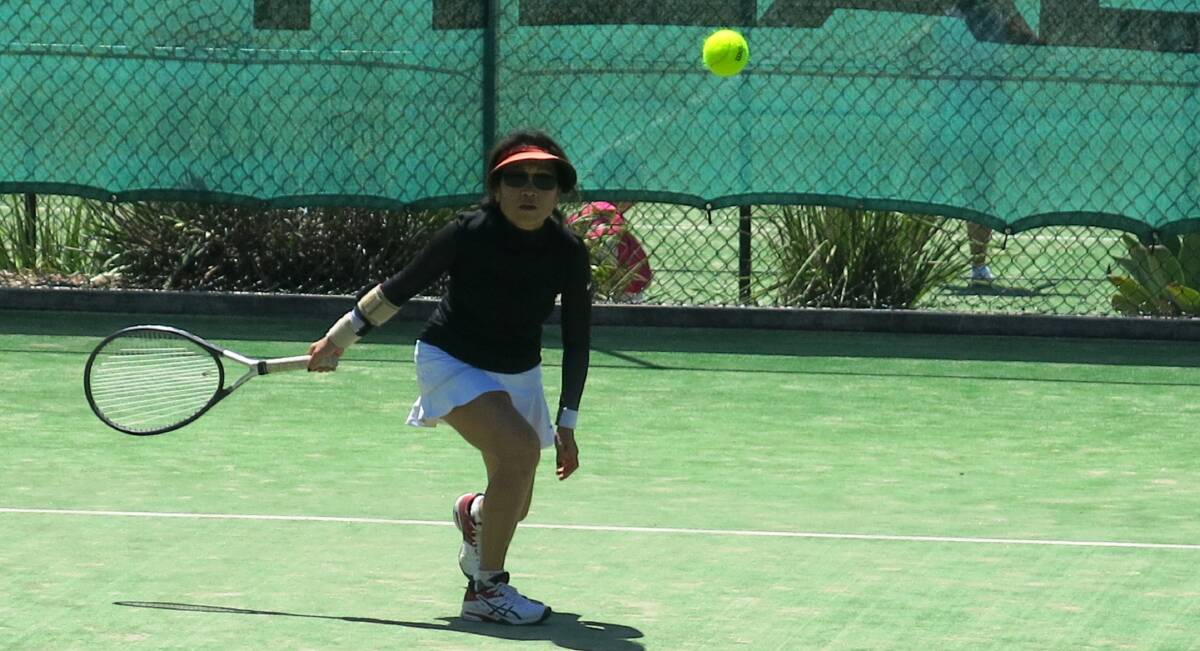ACT visitor: Tui Allison from Canberra returns the ball during the annual Tennis NSW Seniors Tournament in Milton and Ulladulla.