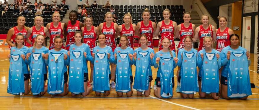 Emma Keane (front row, fifth from left) and her NSW team with the Sydney Swifts. Photo: Netball NSW