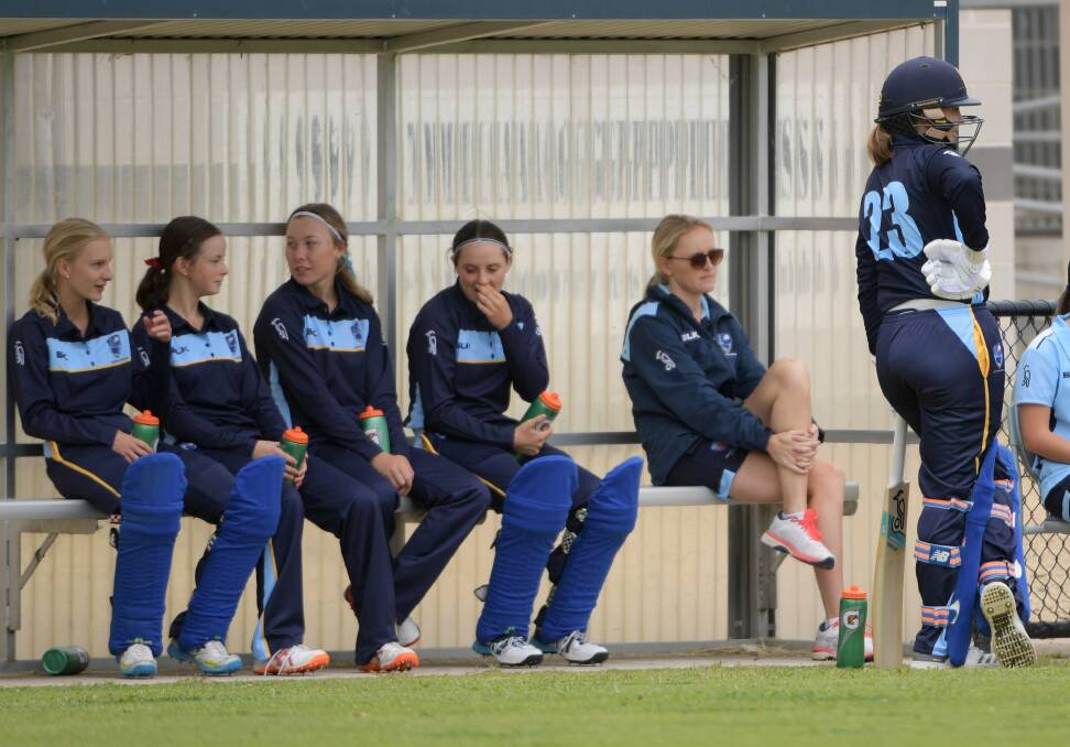 Tara Rudd (left) and her ACT/NSW Country team mates. Photo: CRICKET NSW