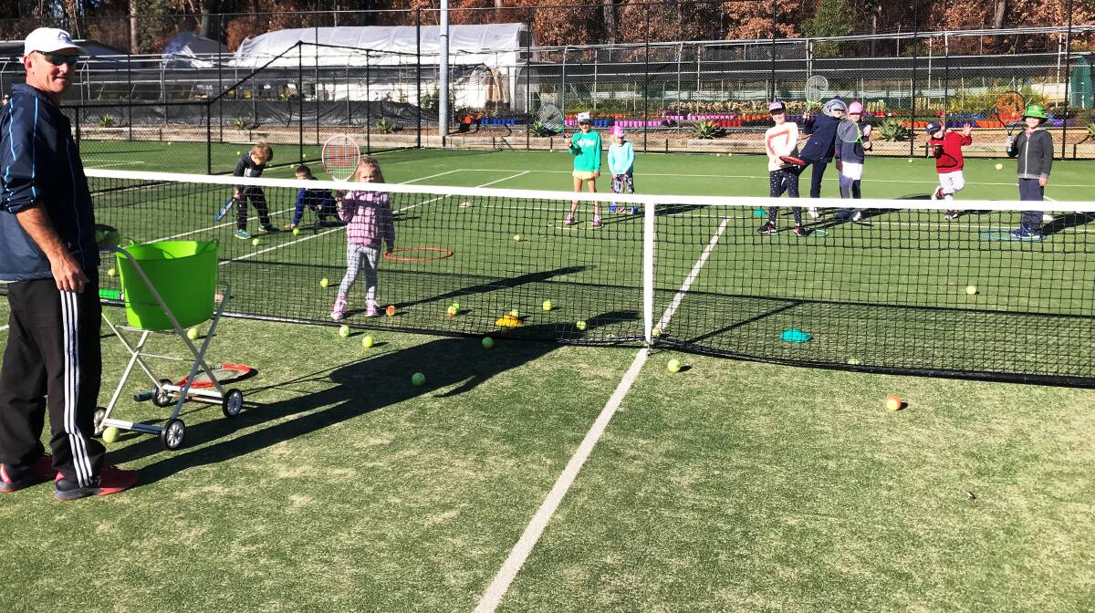 Learning the basics: A school holiday clinic at Ulladulla last week with coach Kevin Murphy.
