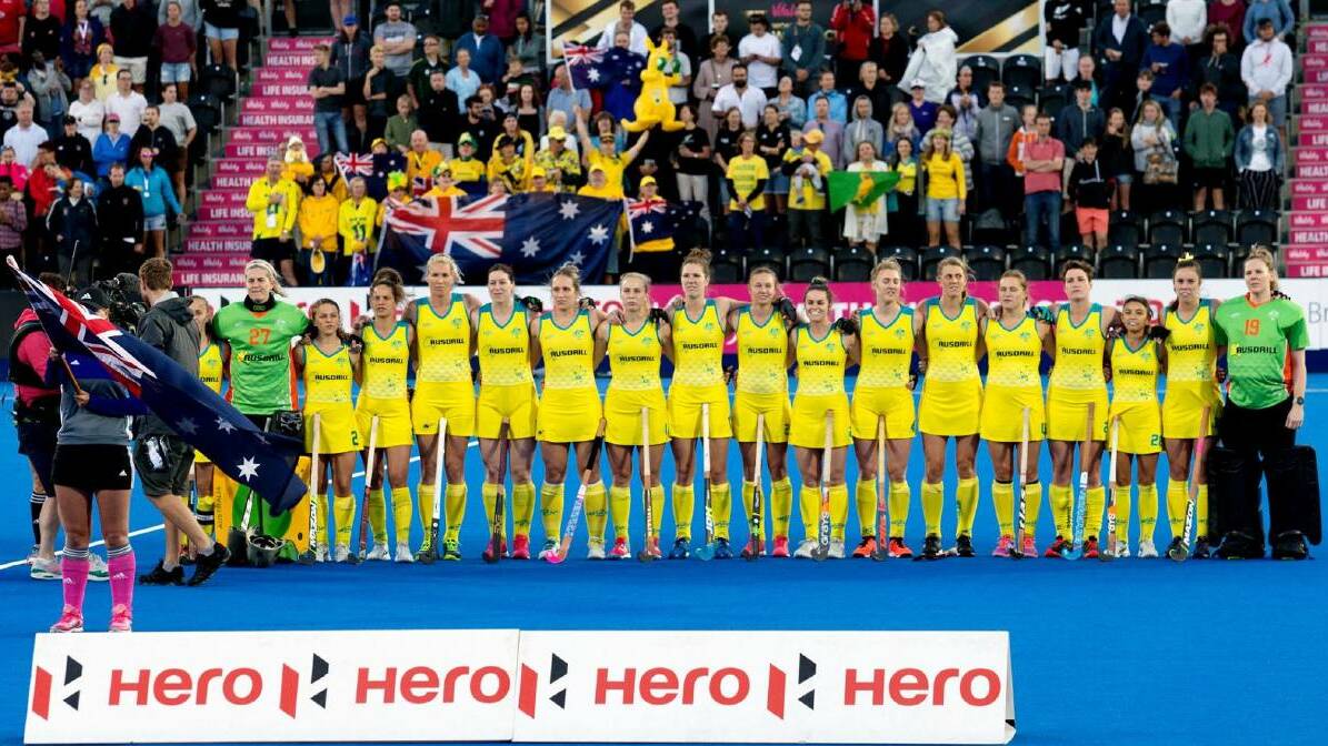 Kalindi Commerford (eighth from right) and her Hockeyroos team at the 2018 World Cup. Photo: WORLD SPORTS PICS