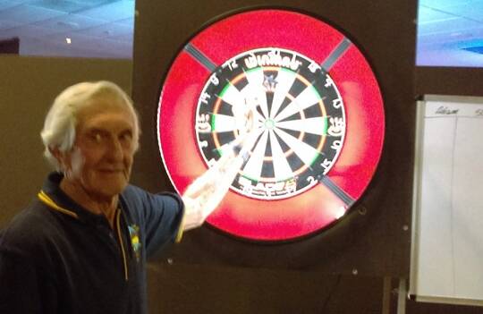 On target: Col Estreich threw 3 x 180 scores in one evening last Tuesday! A pretty mean feat and probably the first time ever in Ulladulla darts competition.