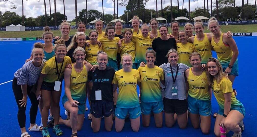 Grace Stewart (back row, second from left), Kalindi Commerford (middle row, third from left) and their Hockeyroos squad. Photo: HOCKEY AUSTRALIA