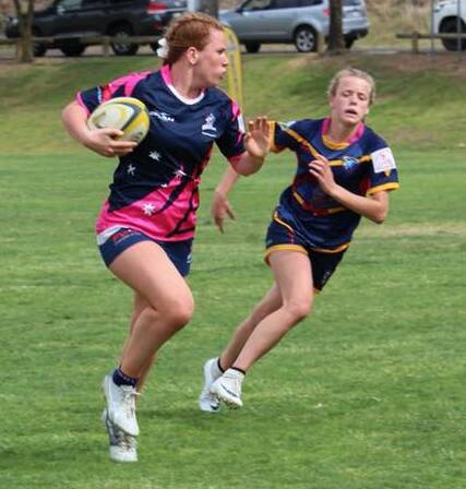 RISING STAR: Narrawallee's Grace Sullivan, in action for the Illawarriors, will make the move to Canberra this year to train in the ACT Brumbies system, in a hope of one day achieving her dream of playing professionally.