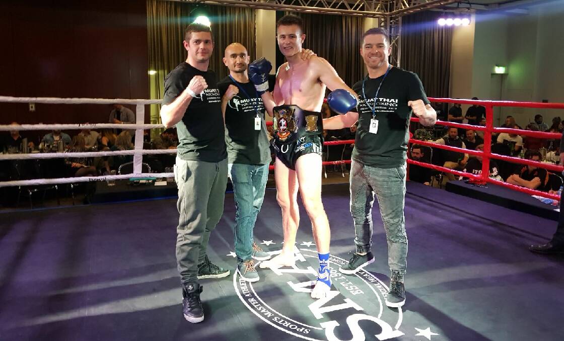 MASSIVE FUTURE: Australian champion Blaise Taylor and his Southern Fitness and Martial Arts team of Duncan McIntosh, Ian Harding and Richard Neradil after the bout in Canberra.