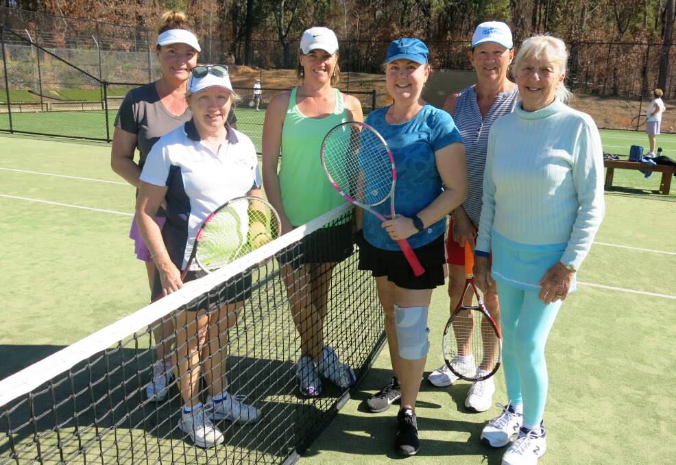 Enjoying the sunshine: Monday ladies comp players Lara, Maureen and Hilary played against Kate, Helen and Barb this week.