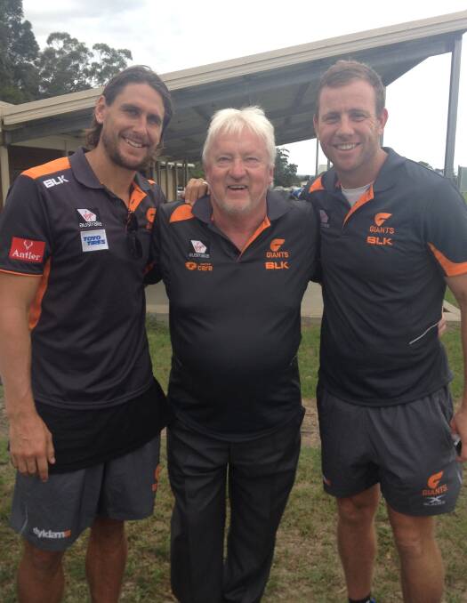 New style: New 17s coach John Dyball picking up some pointers from two of the greats, GWS Giants Ryan Griffen and Steve Johnson.