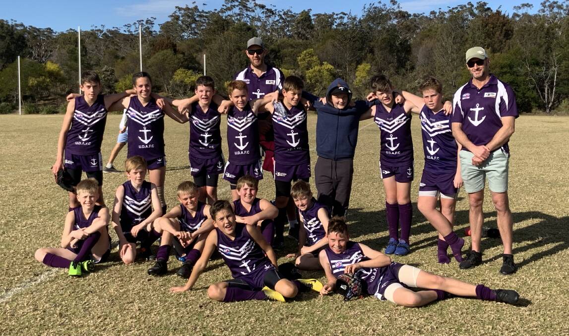 Season over: The Under 13 Dockers went down 45-24 to Bay and Basin despite some awesome ball movement and goal scoring into the wind.