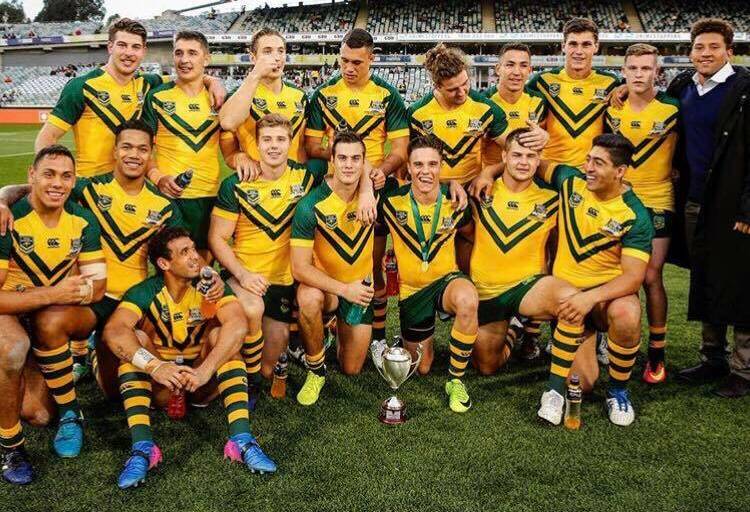 STRONGER AS ONE: Jack Murchie and his Australian junior Kangaroos team mates celebrate their victory against New Zealand in Canberra on Friday.