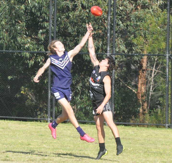 HANG TIME: Ulladulla Dockers' Isaac Anderson was one of this team's top performers in Saturday's AFL South Coast victory against the Port Kembla Blacks. Photo: Kimberley Peat
