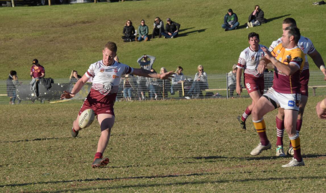 Jake Brisbane puts in a kick for the Eagles against the Sharks in 2019. Photo: Courtney Ward