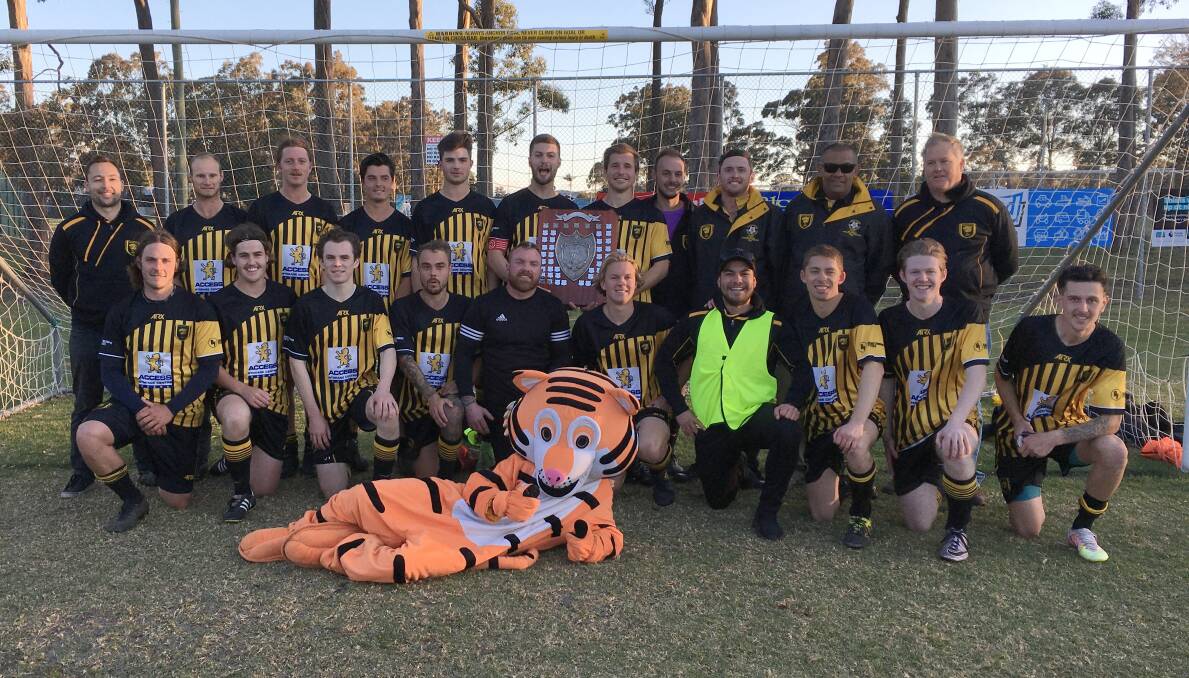 The 2020 Shoalhaven District Football Association first grade premiers Bomaderry at Ison Park on Saturday. Photo: Courtney Ward