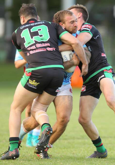 Milton-Ulladulla's Trent Ryan is tackled by two Jamberoo opponents this season. Photo: DAVID HALL