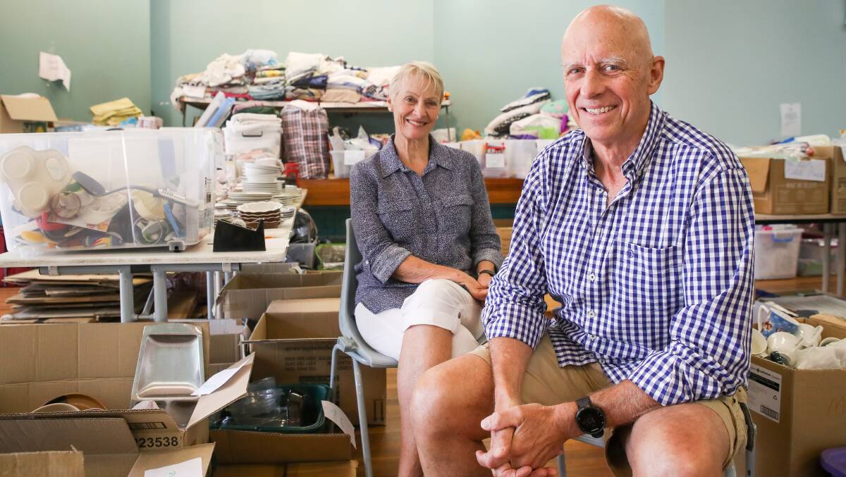 TIRELESS: Lindy and Peter Dunn at the community recovery centre in Lake Conjola in February. Photo: Adam McLean