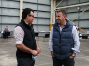 Voters: Gilmore Liberal candidate Andrew Constance (right, with Whitlam candidate Mike Cains) polled strongly in South Coast booths affected by bushfires. Picture: Sylvia Liber