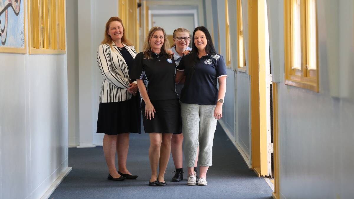 Illawarra Sports High School principal Kerrie Powell, administration support staffer Theresa Sirl, student Tahlia Moran and student learning support officer Skye Lenard.
Picture by Robert Peet