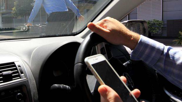 CRACK DOWN: More demerits points will be issued to drivers using their mobile phones while driving. 