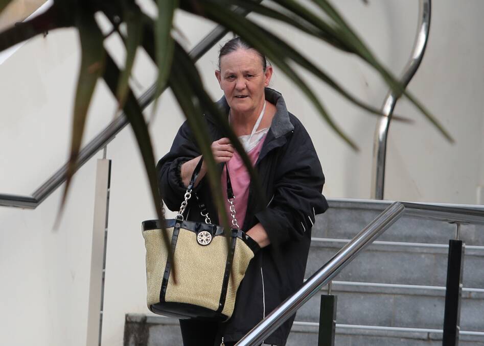 Crazy in love: Debbie Ryan leaves Wollongong courthouse on Friday after escaping jail time on serious fraud matters. 