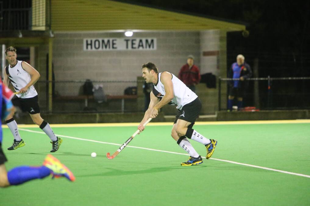Berry's Elliot Ashby under lights at the Bernie Regan Hockey Complex at North Nowra. Picture: Robert Crawford