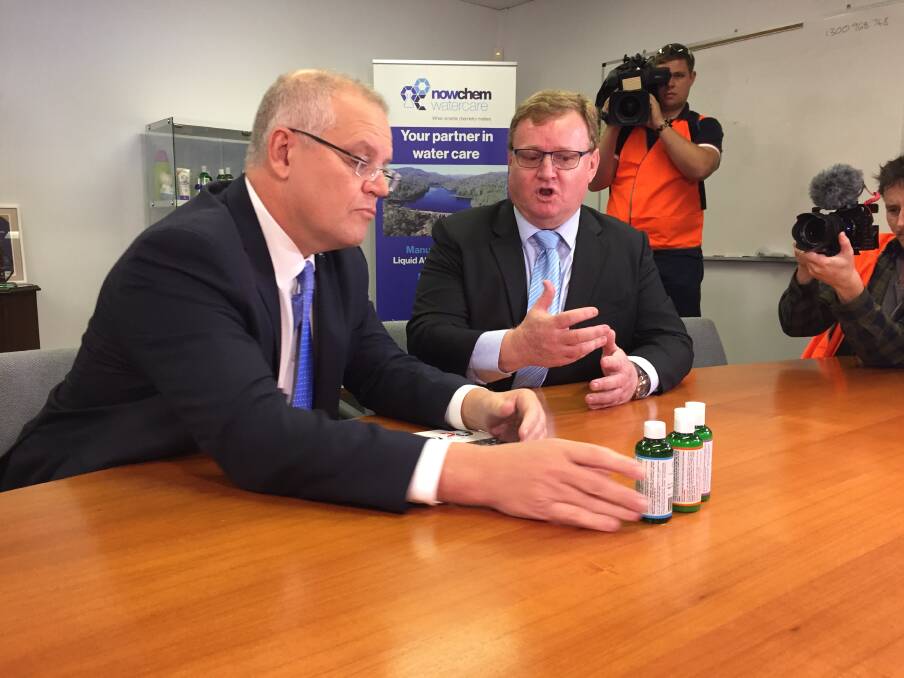Prime Minister Scott Morrison and Nowra Chemicals owner John Lamont at the factory on Albatross Road, South Nowra on Monday. Picture: Rebecca Fist