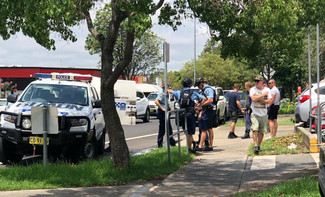 FLASHBACK: Police converge on O'Keeffe Lane in the Nowra CBD to arrest a man allegedly armed with a machete in January.