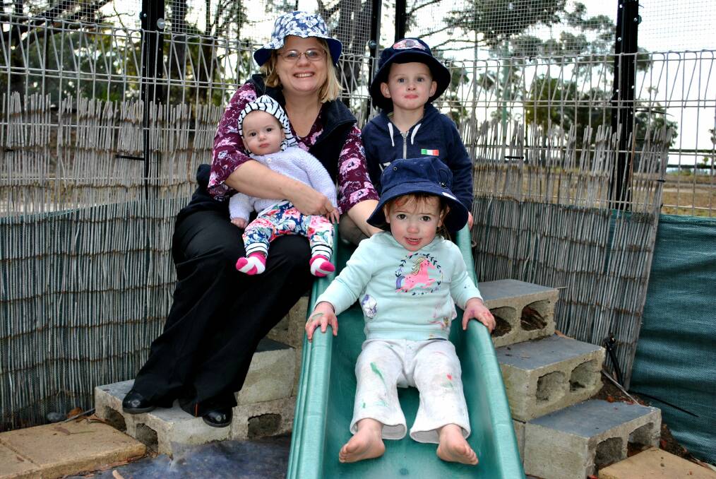AWARDED: Alison Payne with Aria and Alex Carter-James and Scarlette Pryor, who attend her family daycare in Ulladulla. Photo: Emily Barton. 