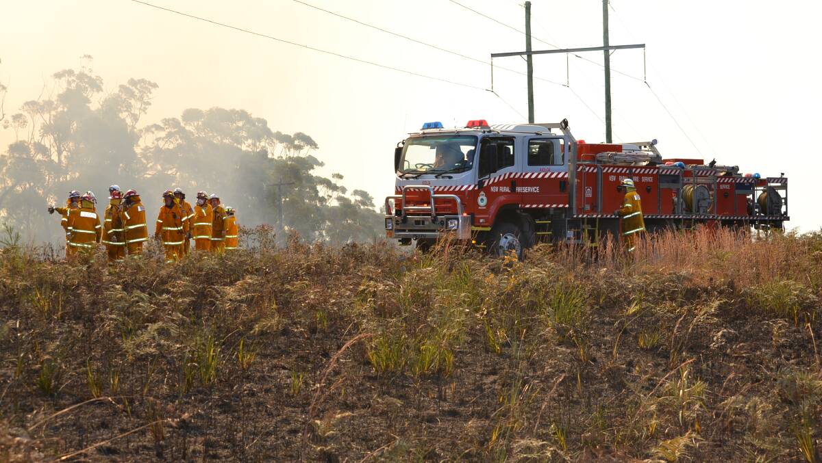 Rural Fire Service crews at the Kinigman Road fire, which burn more than 2200 hectares in August 2018. Photo: Emily Barton. 