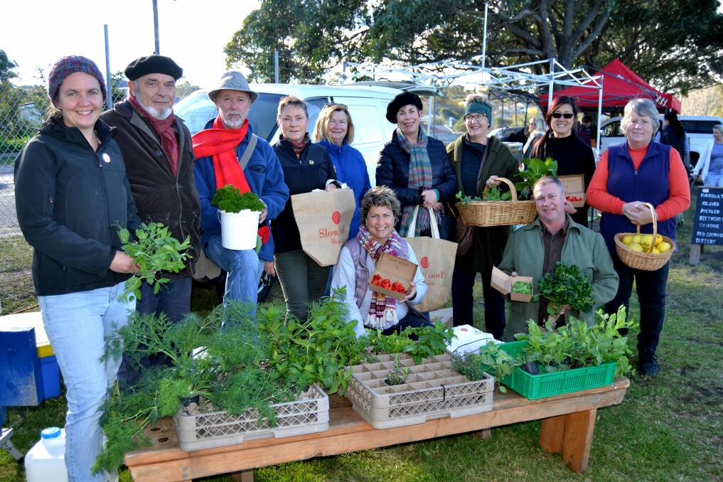 FRESH: Slow Food Shoalhaven is encouraging people to support the Milton Produce Markets. Pictured are shoppers, producers, Slow Food members and market conveners. 