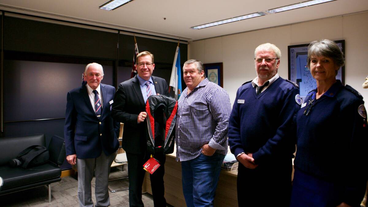 Ulladulla Marine Rescue volunteer Keven Marshall, Minister for Emergency Services Troy Grant, Martin Field, unit comander David Hall and volunteer Gabrielle Boermans.