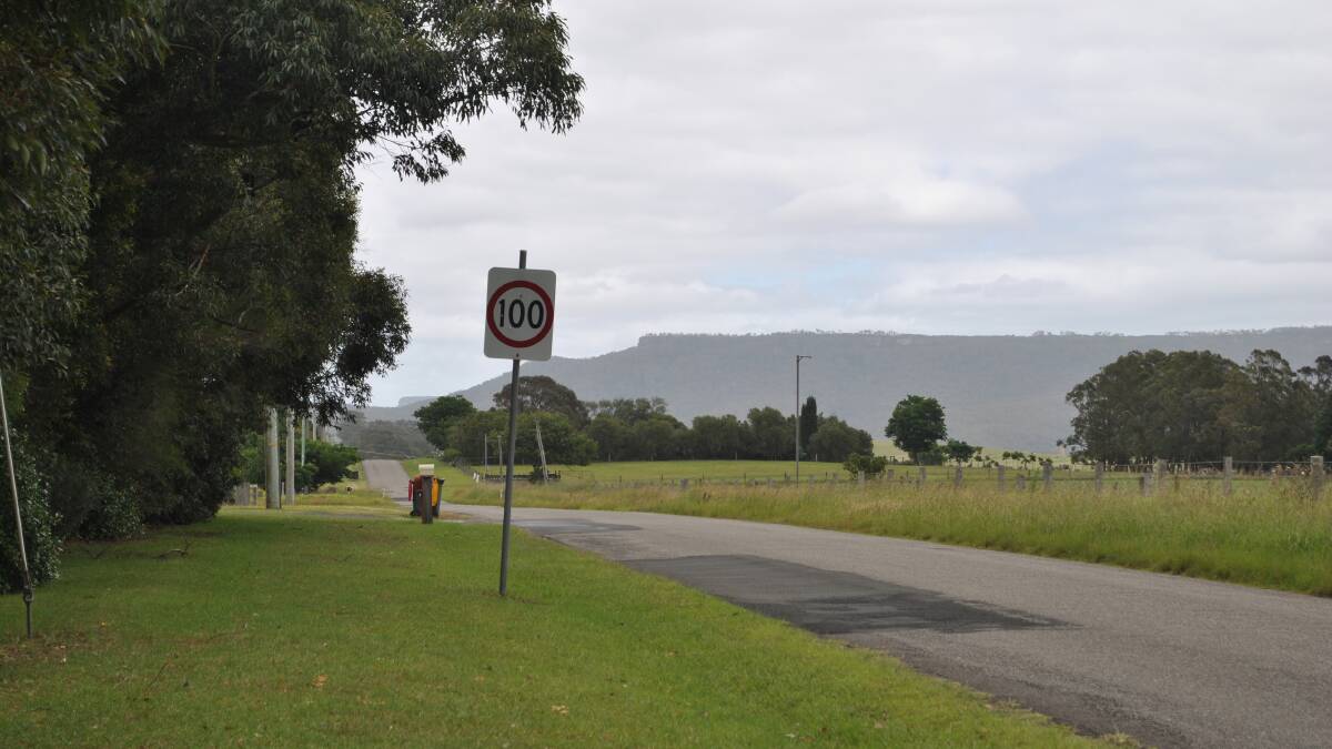 SLOW DOWN: The 100km/h sign on Croobyar Road, Milton. Residents are calling for the speed limit to be reduced to 80km/h. Photo: Jessica McInerney. 
