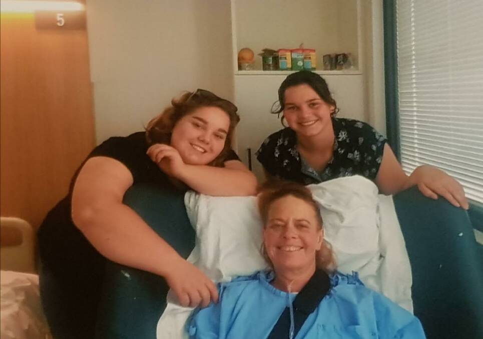Veronika Tuckey pictured recovering in hospital with daughters Brianna and Katrina.