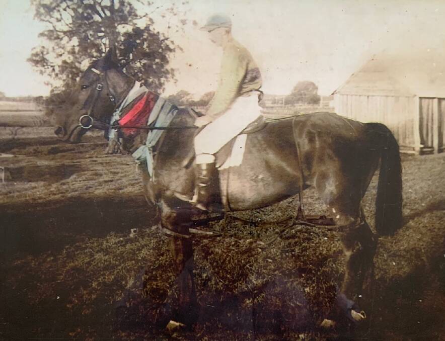 VITAL: Charles Bennett proudly sits aloft champion trotter Greenhills who was also an integral part of the family farm.