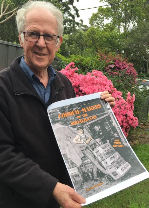 LATEST WORK: Alan Clark proudly shows off the cover of his latest book, Cordial-makers of the Shoalhaven and their bottles, which is being published by the Shoalhaven Historical Society.