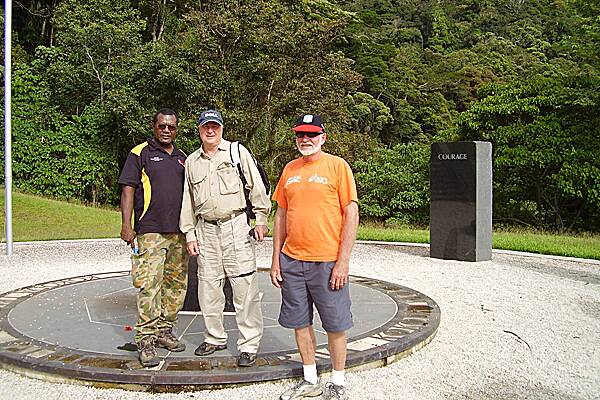 FLASHBACK: Russell Eroro, Milton Lay and Len Thompson at Kokoda. Mr Lay and Mr Thompson met with Mr Eroro and other village Elders to discuss the community hall project. This photo was taken at the Isurava Memorial on the Kokoda Track in 2008.