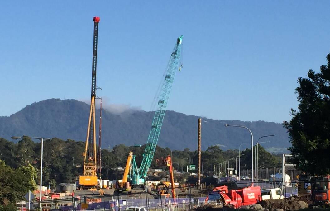 IMPRESSIVE: The piling rig and crane being used by contractors Fulton Hogan to place the first of the pylons for the new four lane $342 million Nowra bridge.