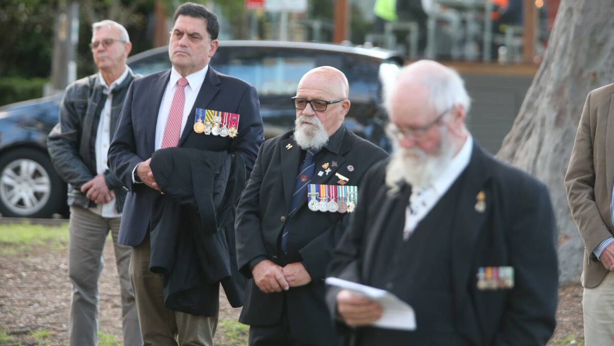SOLEMN: The 2020 Shoalhaven Vietnam Veterans Day service in Walsh Park, Bomaderry.

