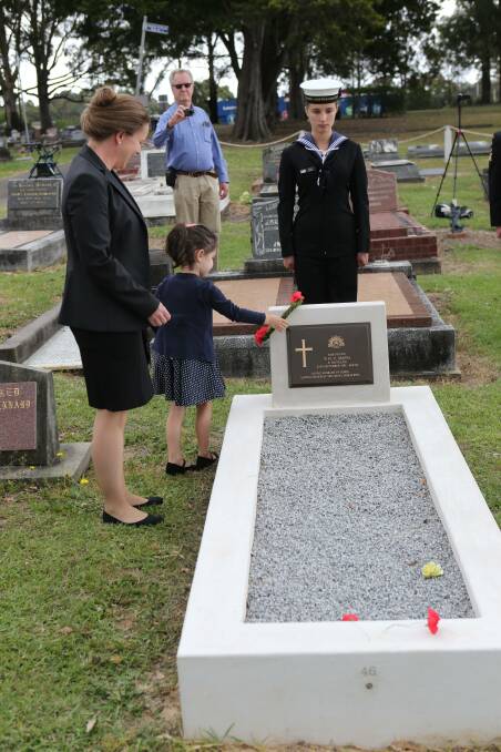 LEST WE FORGET: Percy Smith's great granddaughter Lynda Nolan and her four-year-old daughter Eva, lay a wreath on his grave.