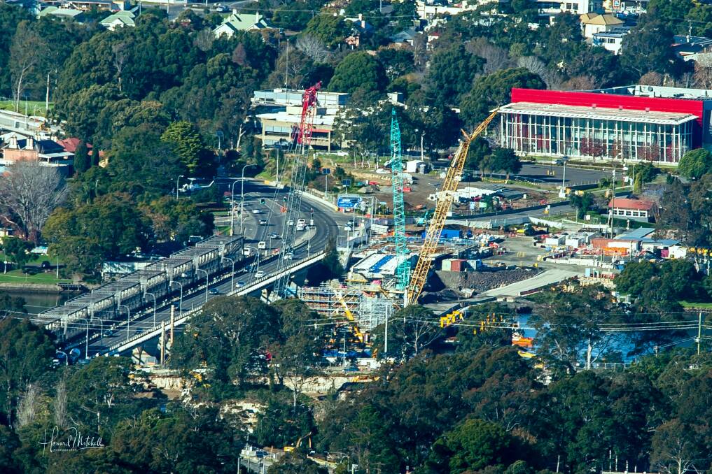 WHAT A VIEW: Local photographer Howard Mitchell's photo of the new Nowra bridge work from atop Cambewarra Mountain.