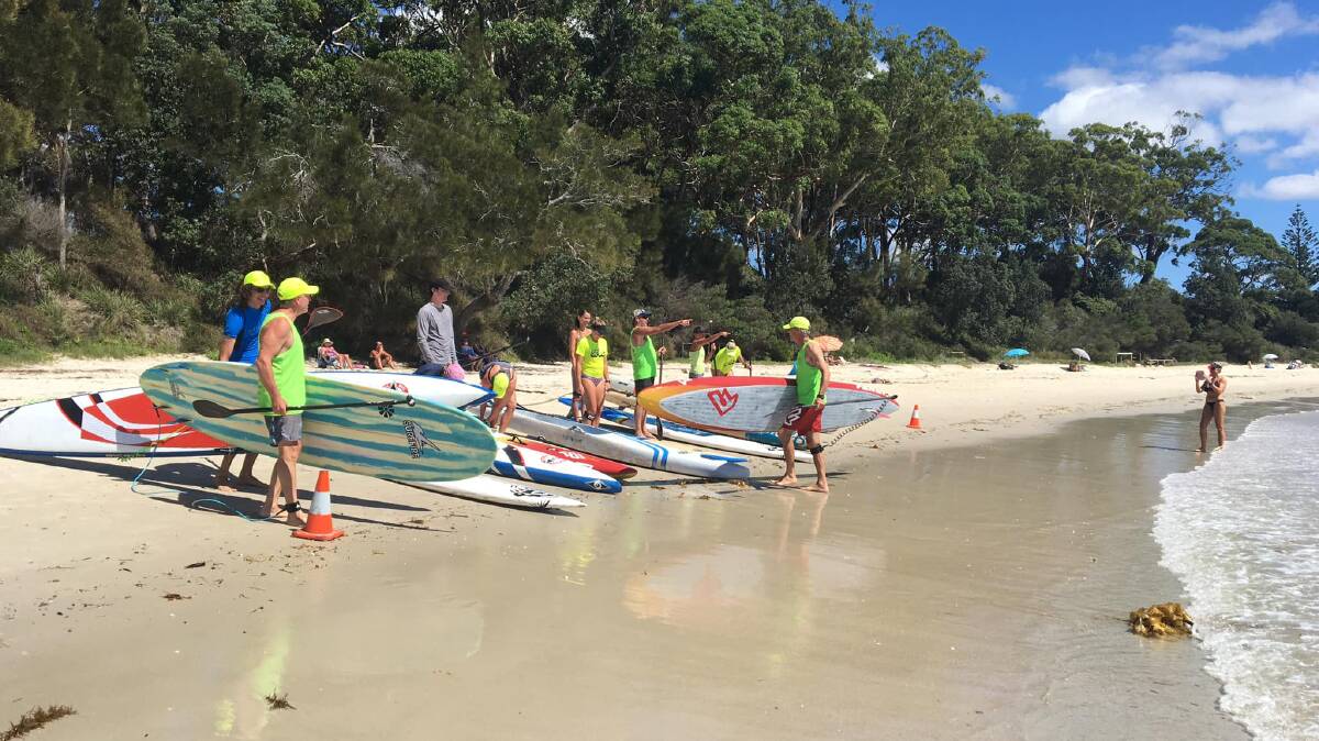 SUPPORT: The Husky Standup Paddleboard Club is one of 13 Illawarra Shoalhaven clubs to be given emergency first aid kits customised for shark attacks. Image: Supplied