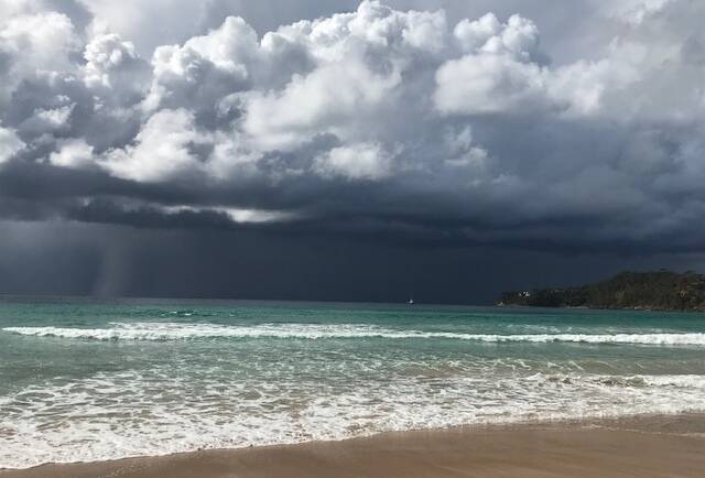 PIC OF THE DAY: Dorothy Buck captured Monday's storm rolling on over Narrawallee Beach. Email images to damian.mcgill@austcommunitymedia.com.au
