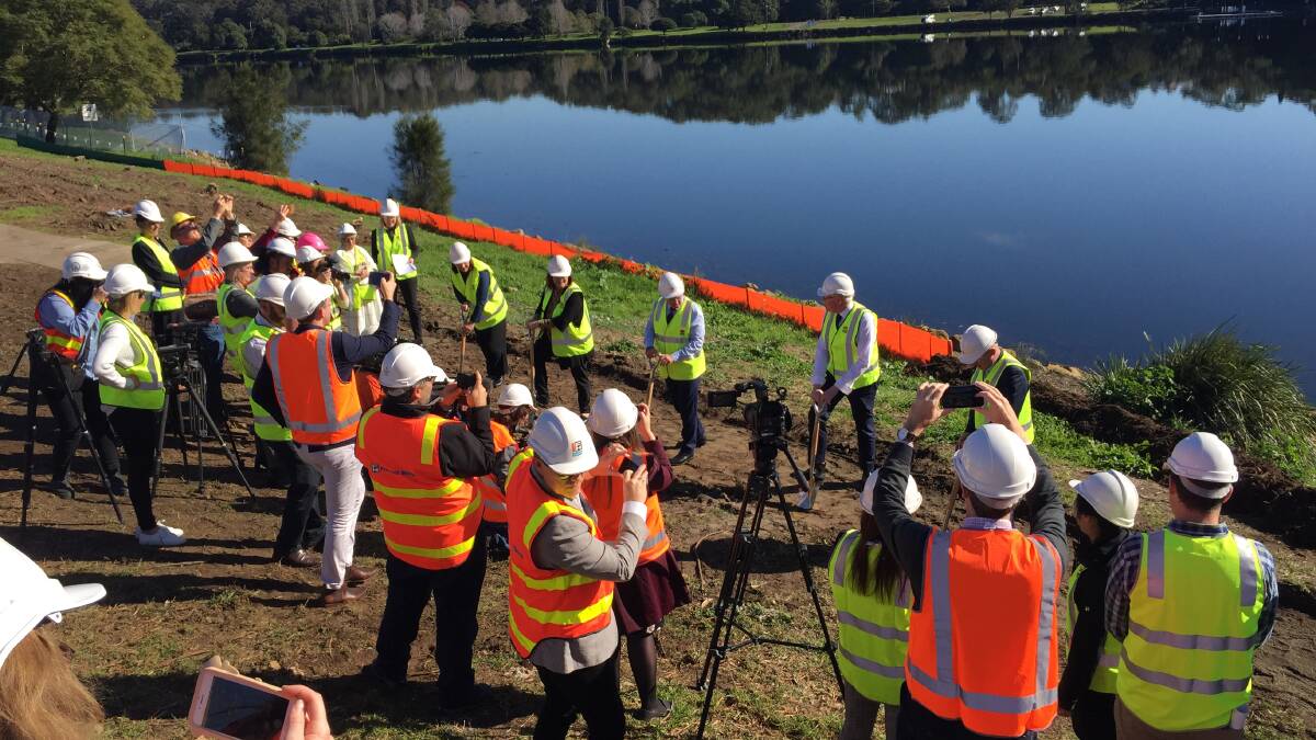 CAST OF THOUSANDS: Transport for NSW and Fulton Hogan staff, along with local media look on as the first sods are turned for the new $342 million Nowra bridge.
