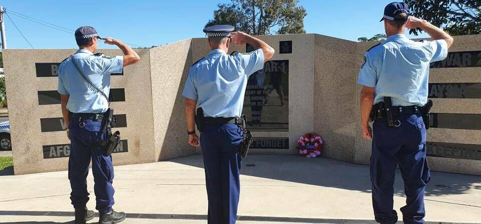 South Coast Police officers show their respect at Ulladulla.