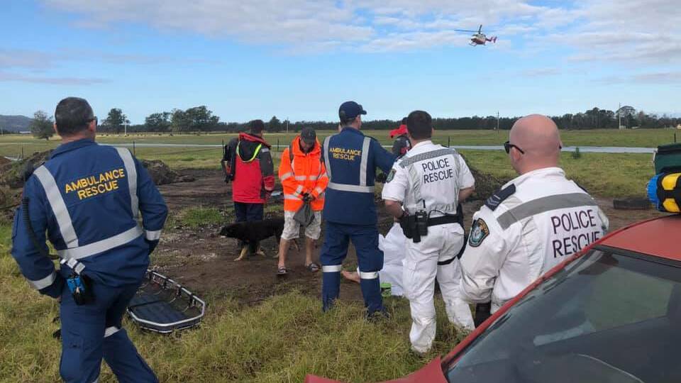 RESCUE MISSION: Emergency services wait for a helicopter to land on Pig Island on Tuesday afternoon. Image NSW Police Rescue & Bomb Disposal Facebook