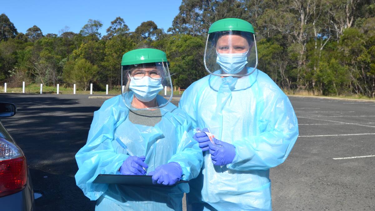 READY TO GO: Southern IML Pathology Collectors Kristy Brown and Susanne Cole at the at the North Nowra pop up drive-through clinic.. Image: Grace Crivellaro.