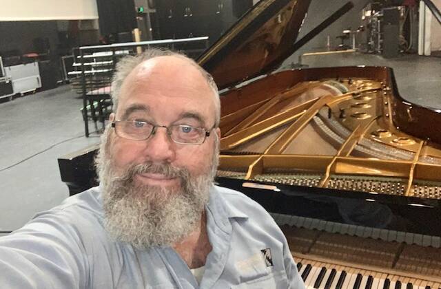 David Ricketts has been tuning pianos for 30 years and said more people are taking up the art. Picture supplied.