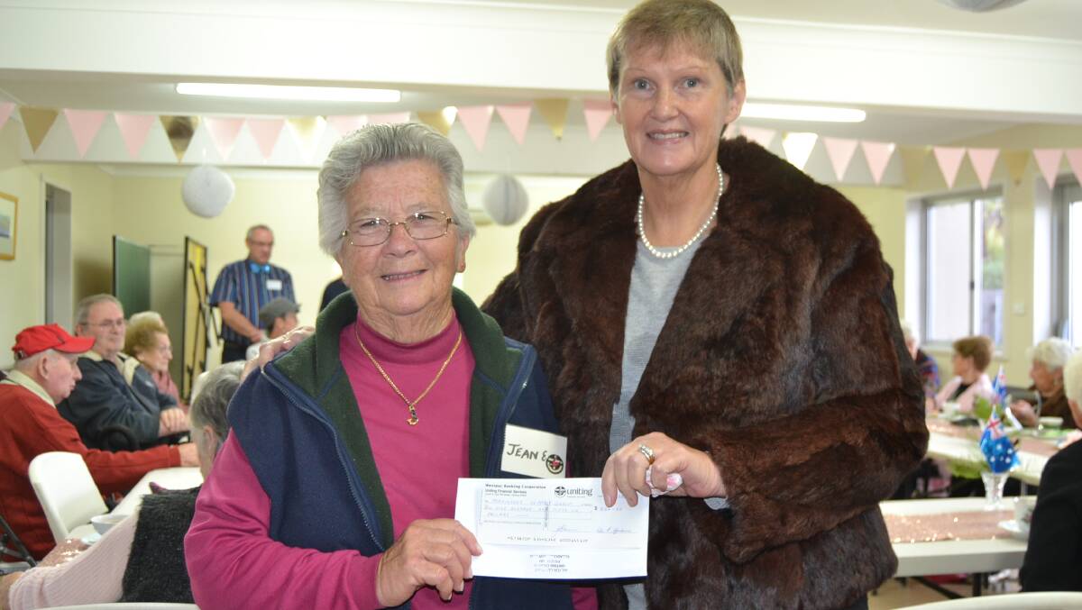 Uniting Church member Jean Erwin and Alison Easton. The Church donated their takings from their monthly morning tea fundraiser.