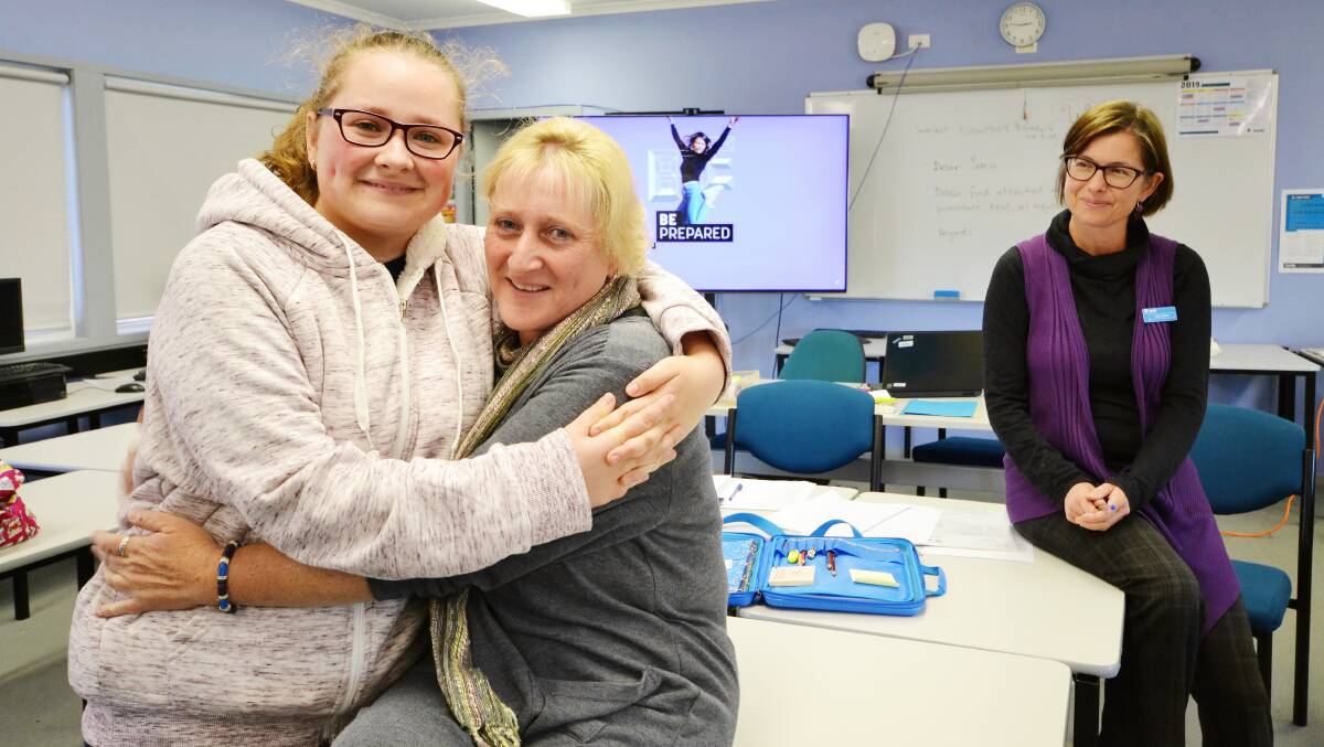 Ulladulla mother and daughter Collette and Taleatha McFarlane and TAFE NSW Ulladulla teacher Sara Eastway. Picture: Adam Wright/TAFE NSW.