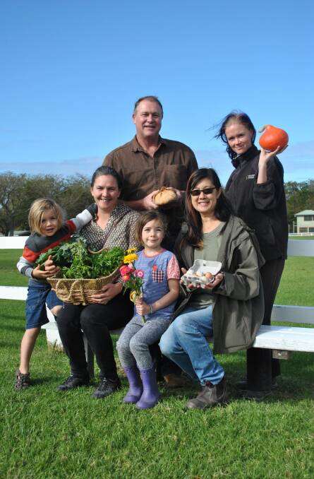 LOCAL PRODUCERS: Future Milton Produce Market stallholders Allan Dixon, Mandy Andresen, (front) Anna Sim with Jasper and Delphi Sim-Hughes and Sharyn Prendergast hold an array of locally grown or produced goods.