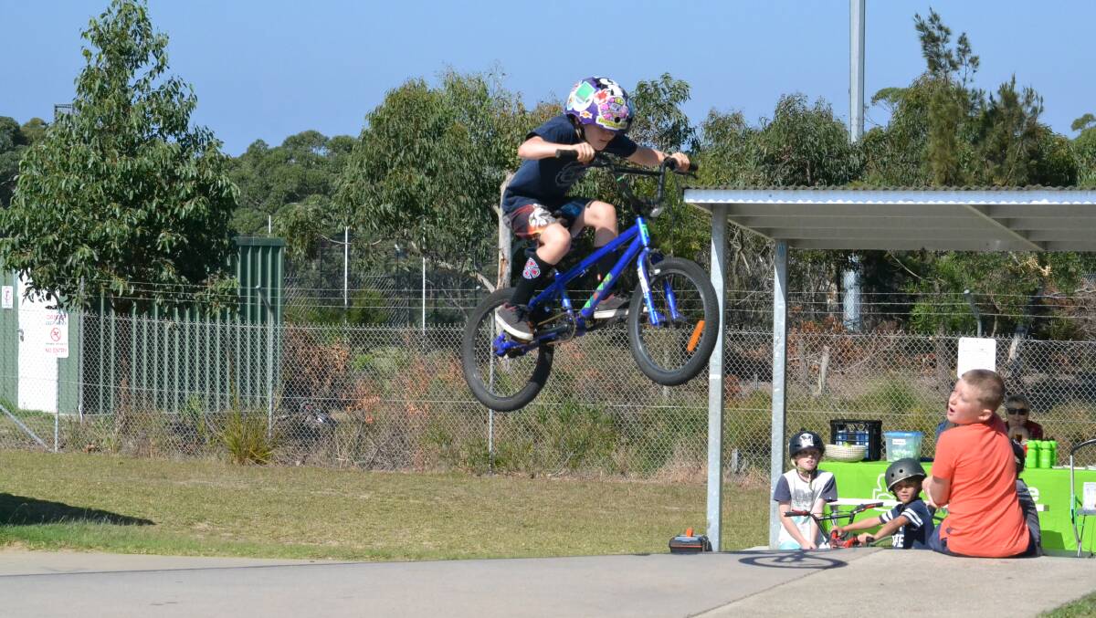 Ben James soars during a BMX learning day earlier this year at Ulladulla Skate Park.