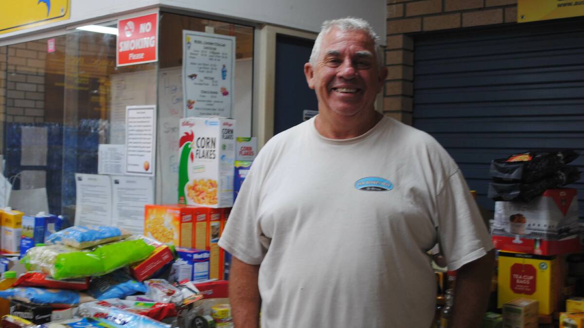 Volunteer Stephen Fennell has been blown away by the generosity thats filled the distribution centre of goods at Milton Showground.